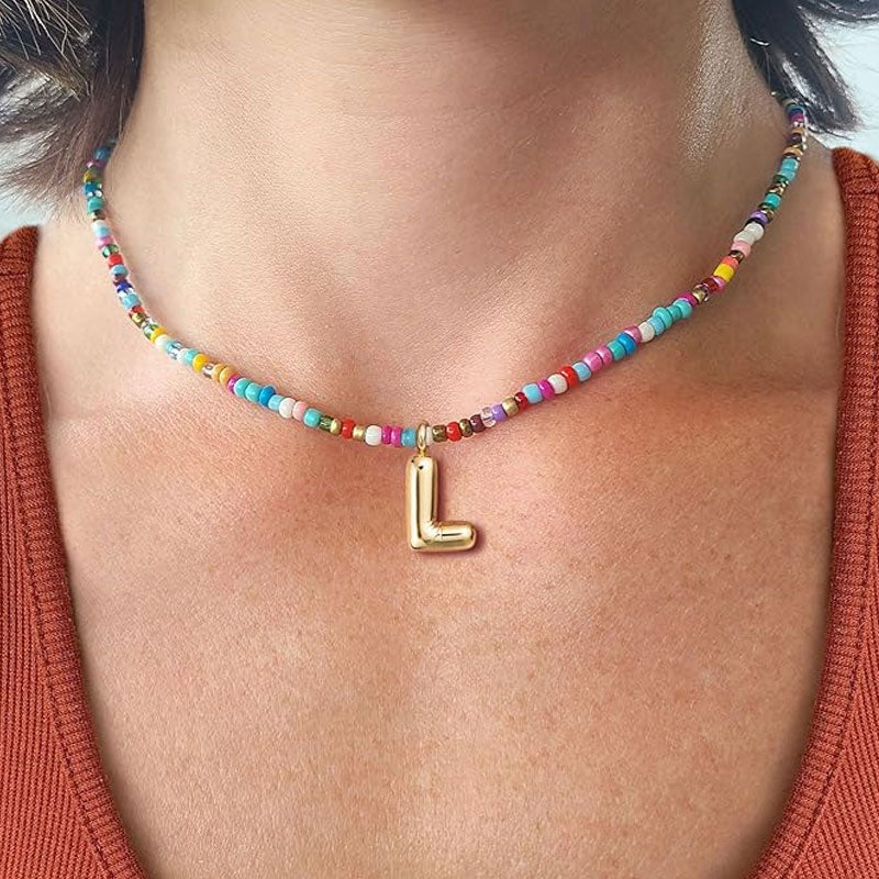 Necklace with initials in pearls