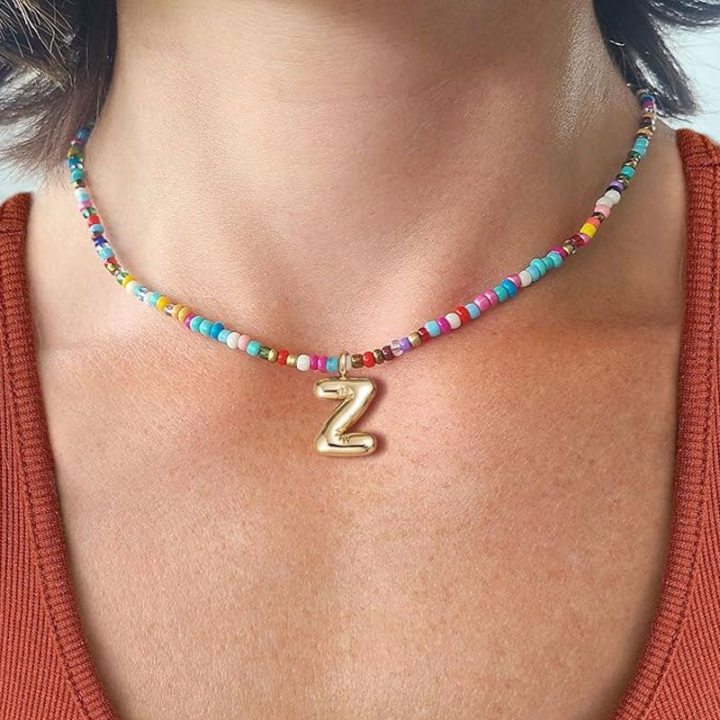 Necklace with initials in pearls