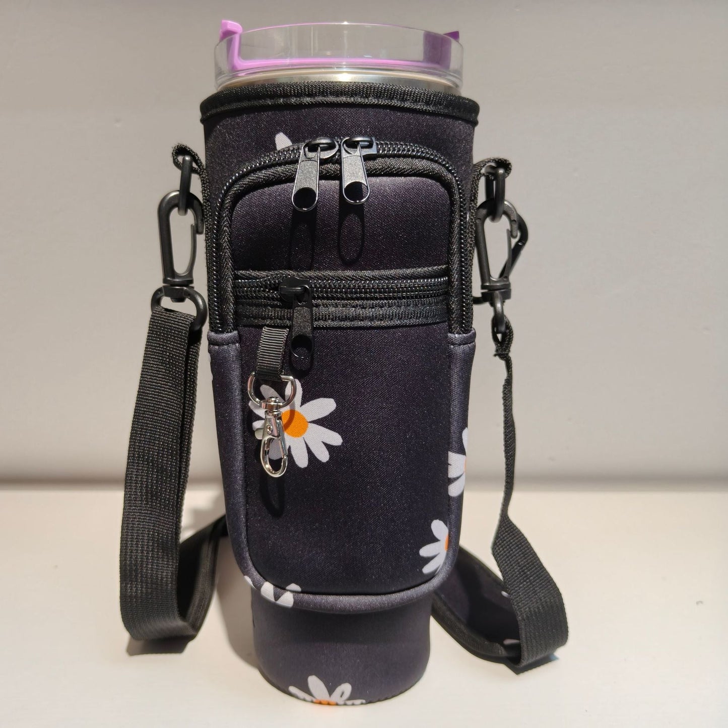 Adjustable shoulder bag with insulated cup holder for 40 oz