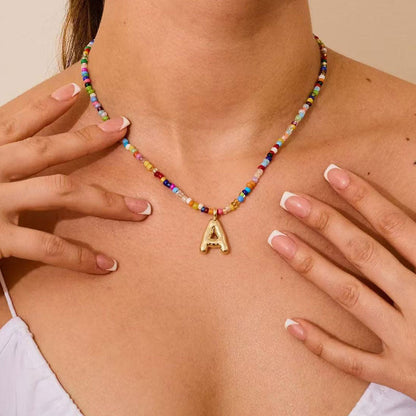 Necklace with initials in pearls